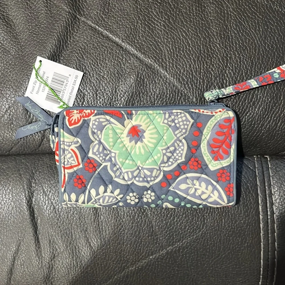 Vera Bradley front zip wallet in nomadic floral